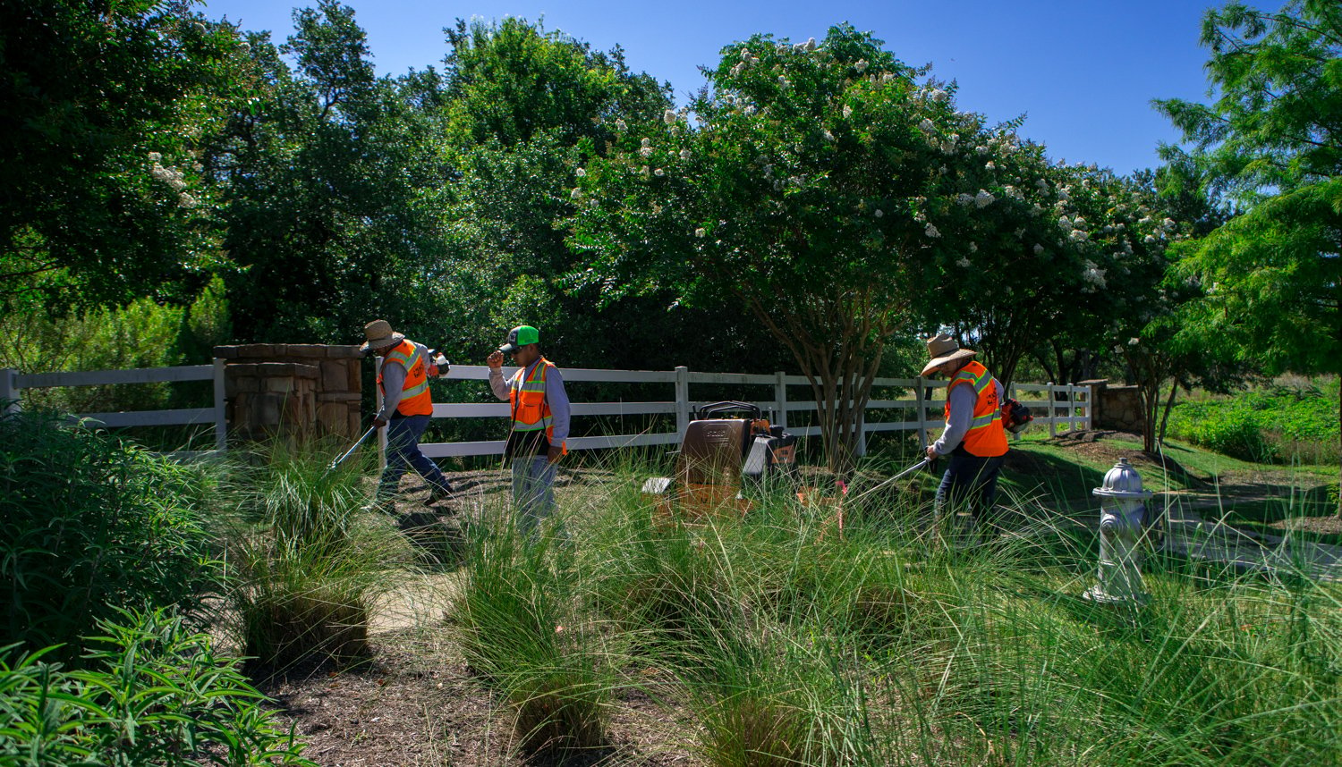 Apartment complex landscape maintenance crew