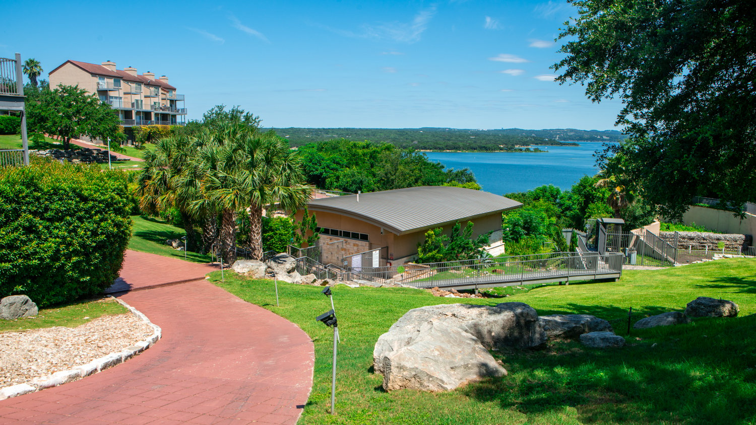 Well-maintained apartment complex landscape in Austin, TX