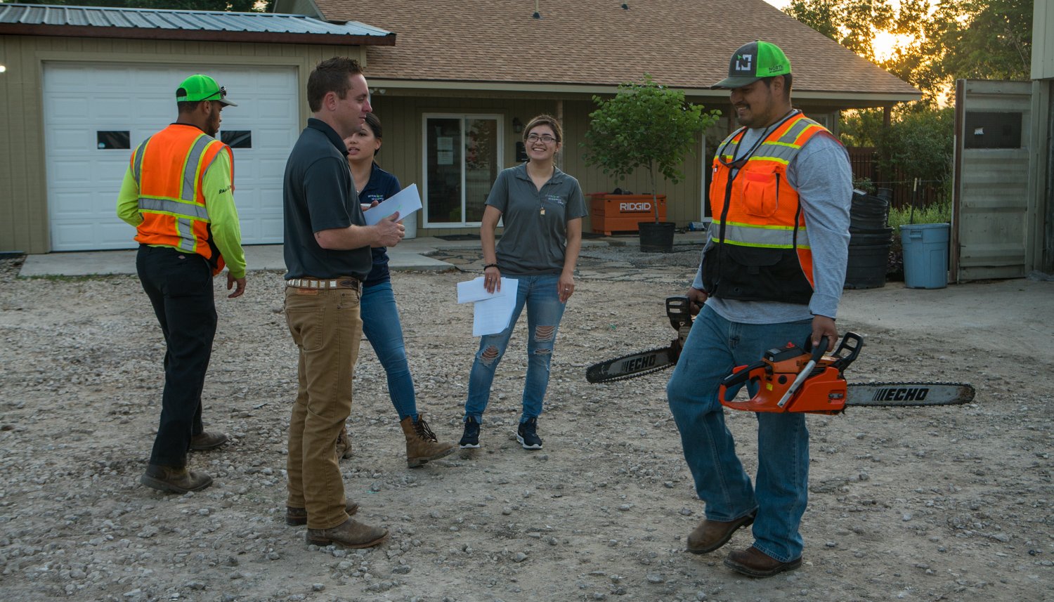 polite commercial landscaping design and construction crew