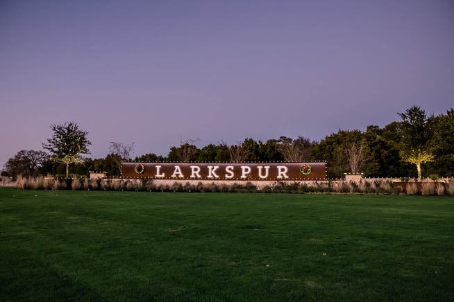 holiday lighting on entrance sign HOA