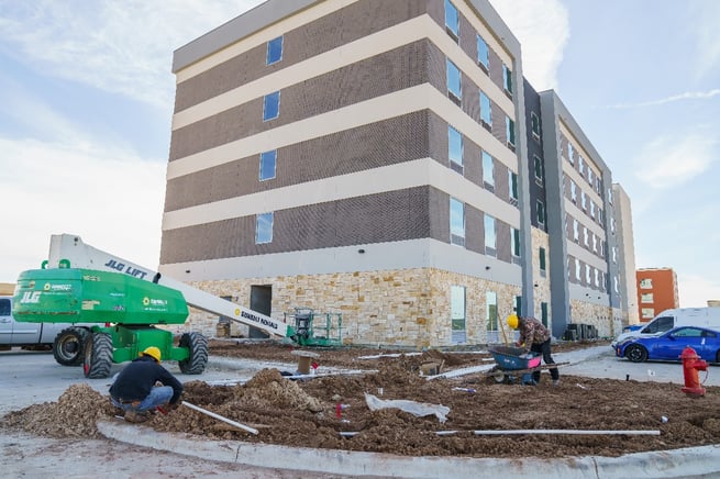 commercial landscapers working at Tru and Home2 Suites By Hilton