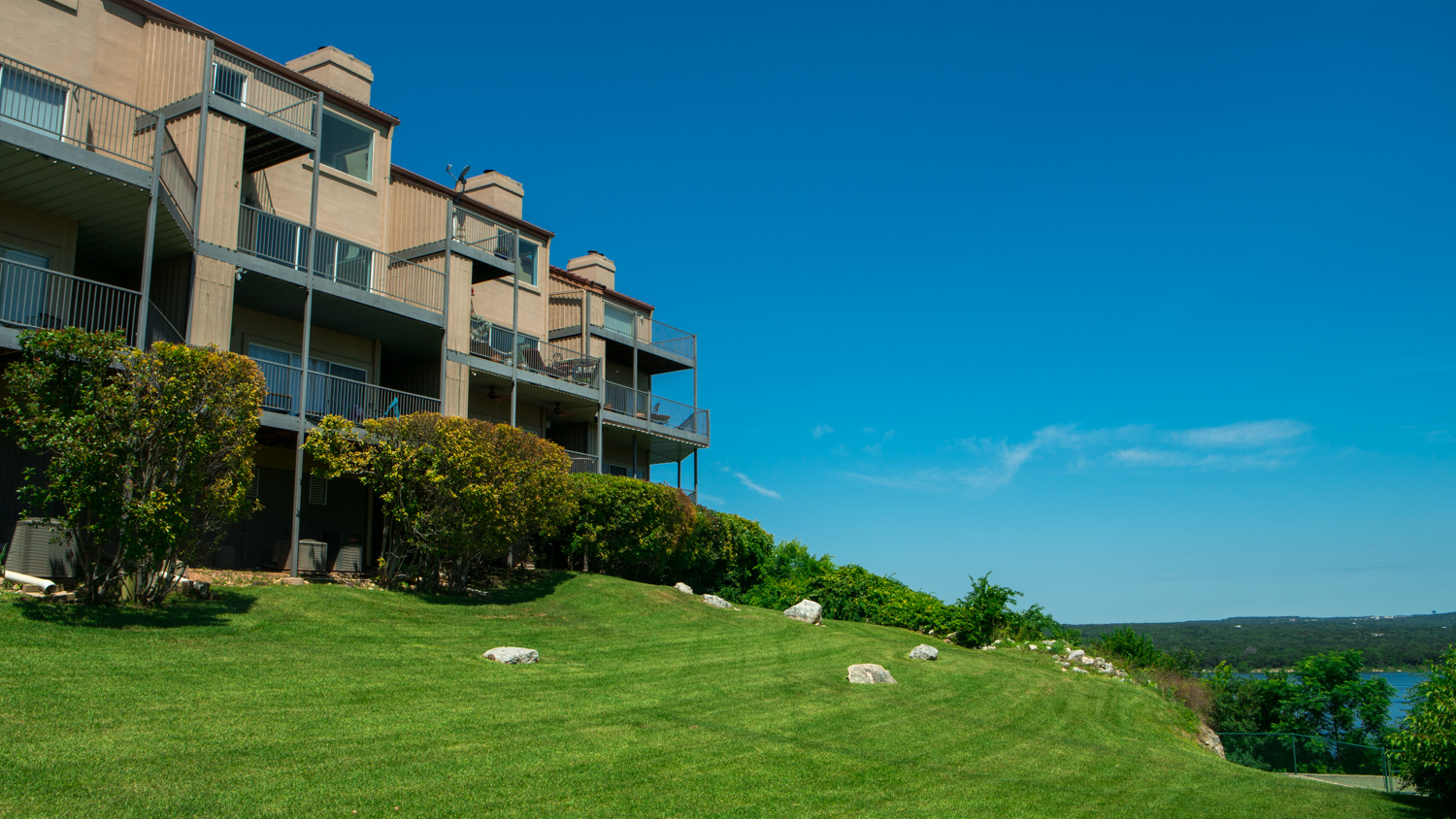 Apartment complex landscape maintained by North by Northwest