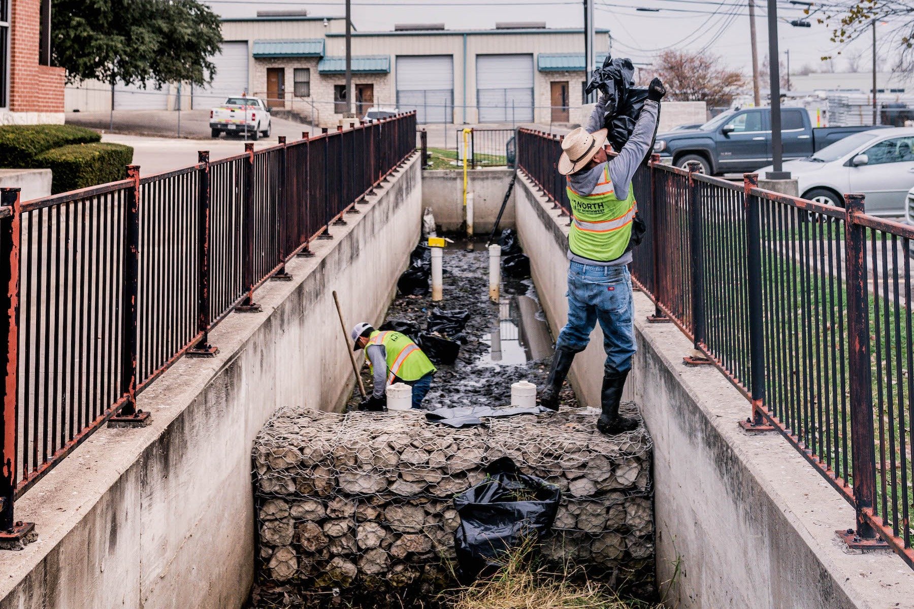 Detention basin being repaired at Austin Chase Bank